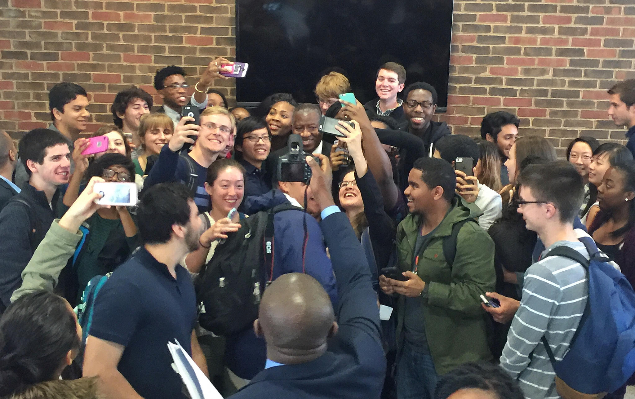 Former President Goodluck Jonathan visited The Presidential Precinct in Virginia, USA on November 9, 2015. Students in a mad rush to get a selfie with Dr. Jonathan| Flickr/The Presidential Precinct 