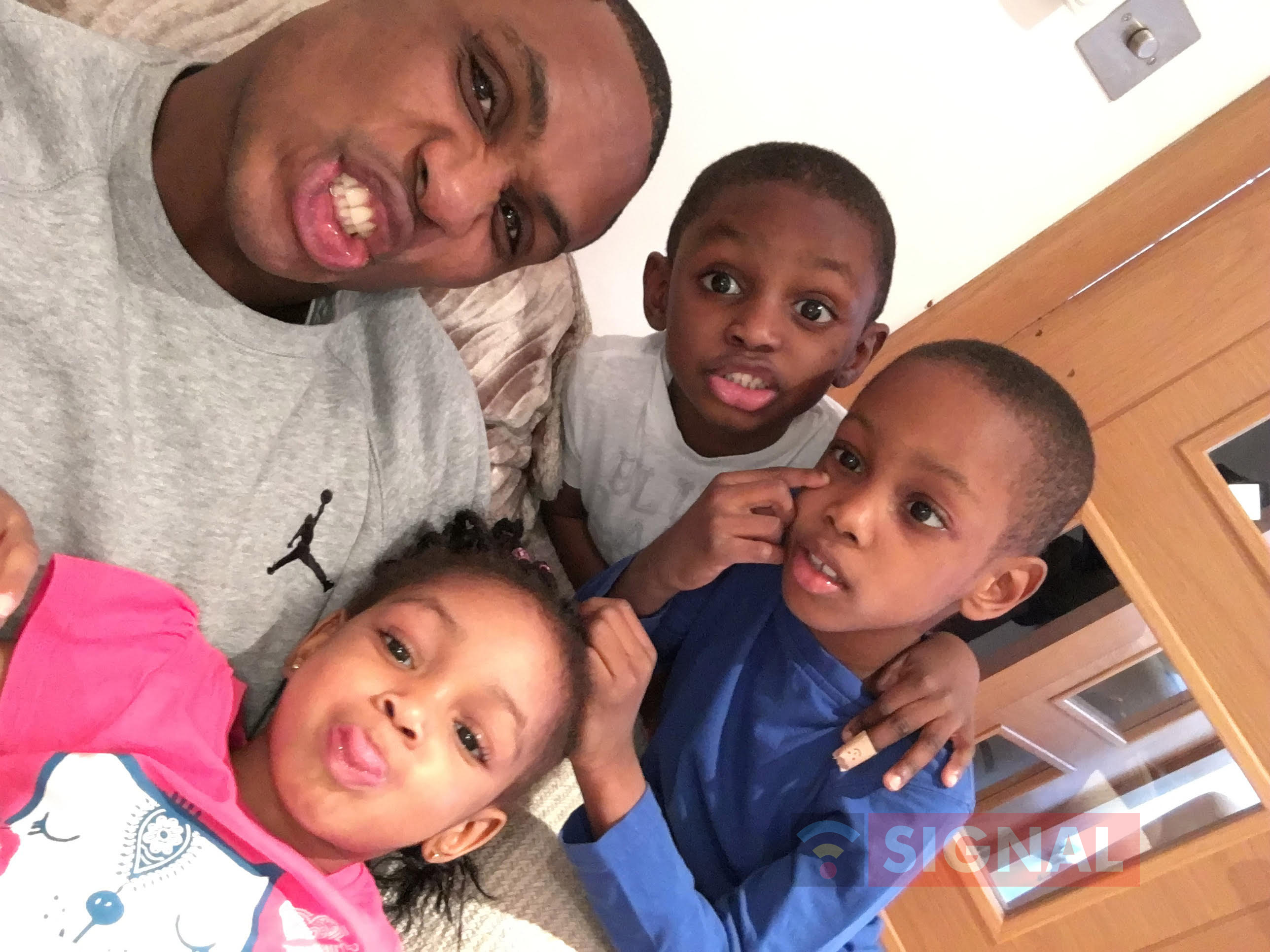 Odion Ighalo relaxes at home with his three kids | Photo: SIGNAL 