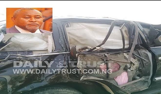 The ill-fated car in which the minister was traveling on Sunday | (Inset) Late Ocholi